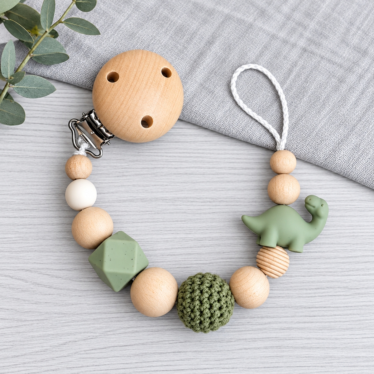 Schnullerkette Dino olive