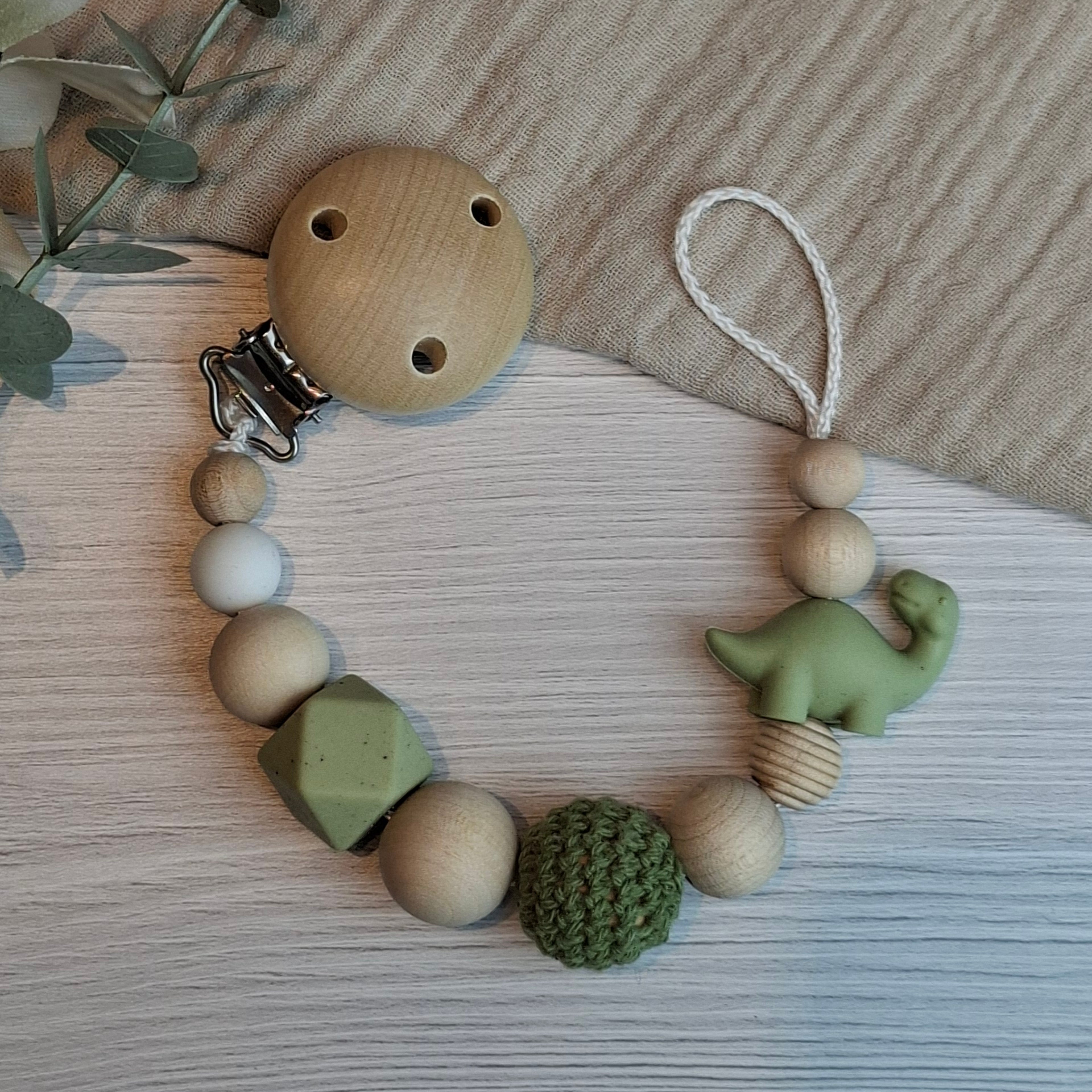 Schnullerkette Dino olive